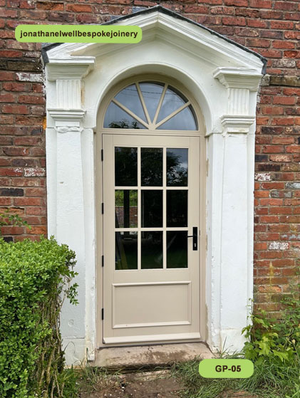 9 pane glazed panel door arched fanlight