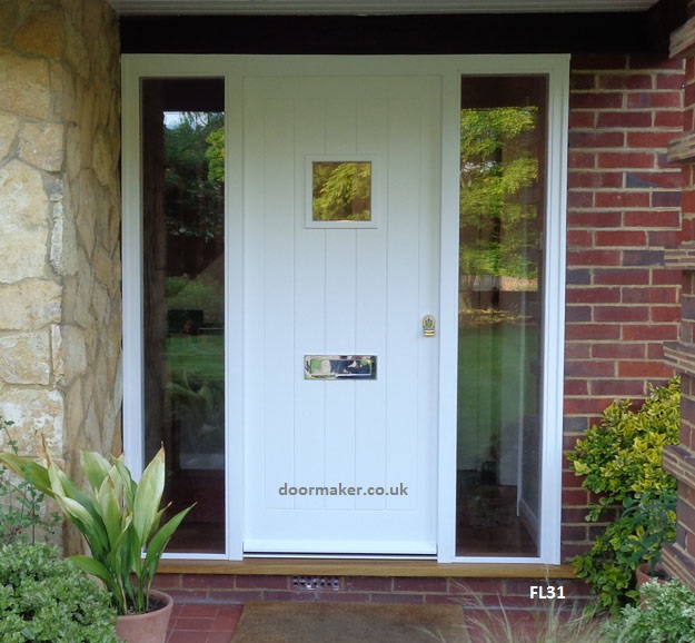 white cottage door with sidelights