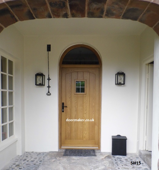 oak door swept head arched toplight