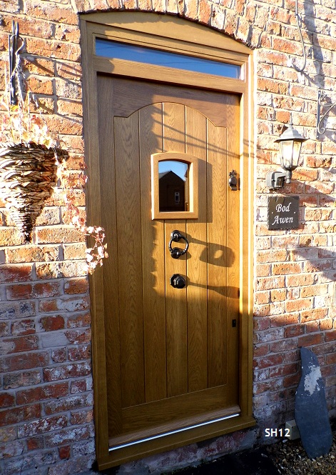 oak door with swept head and vision